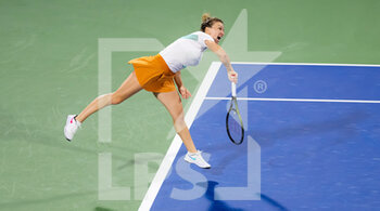 2022-02-17 - Simona Halep of Romania in action against Ons Jabeur of Tunisia during the quarter-final of the 2022 Dubai Duty Free Tennis Championships WTA 1000 tennis tournament on February 17, 2022 at The Aviation Club Tennis Centre in Dubai, UAE - 2022 DUBAI DUTY FREE TENNIS CHAMPIONSHIPS WTA 1000 TENNIS TOURNAMENT - INTERNATIONALS - TENNIS
