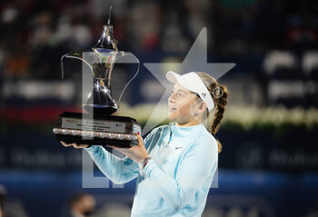 2022-02-19 - Jelena Ostapenko of Latvia poses with the winners trophy after winning the final of the 2022 Dubai Duty Free Tennis Championships WTA 1000 tennis tournament on February 19, 2022 at The Aviation Club Tennis Centre in Dubai, UAE - 2022 DUBAI DUTY FREE TENNIS CHAMPIONSHIPS WTA 1000 TENNIS TOURNAMENT - INTERNATIONALS - TENNIS