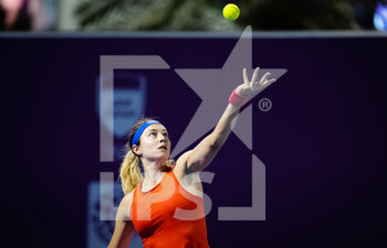 2022-02-20 - Stefanie Voegele of Switzerland in action during the first round of the 2022 Qatar TotalEnergies Open, WTA 1000 tennis tournament on February 20, 2022 at Khalifa tennis and squash complex in Doha, Qatar - 2022 QATAR TOTALENERGIES OPEN, WTA 1000 TENNIS TOURNAMENT - INTERNATIONALS - TENNIS