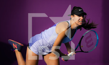 2022-02-21 - Oceane Dodin of France in action against Jelena Ostapenko of Latvia during the first round of the 2022 Qatar TotalEnergies Open, WTA 1000 tennis tournament on February 21, 2022 at Khalifa tennis and squash complex in Doha, Qatar - 2022 QATAR TOTALENERGIES OPEN, WTA 1000 TENNIS TOURNAMENT - INTERNATIONALS - TENNIS