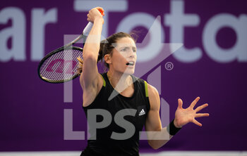 2022-02-21 - Andrea Petkovic of Germany in action against Viktorija Golubic of Switzerland during the first round of the 2022 Qatar TotalEnergies Open, WTA 1000 tennis tournament on February 21, 2022 at Khalifa tennis and squash complex in Doha, Qatar - 2022 QATAR TOTALENERGIES OPEN, WTA 1000 TENNIS TOURNAMENT - INTERNATIONALS - TENNIS