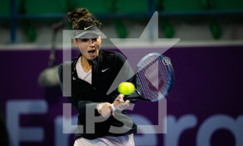 2022-02-21 - Jaqueline Cristian of Romania in action against Elena Rybakina of Kazakhstan during the first round of the 2022 Qatar TotalEnergies Open, WTA 1000 tennis tournament on February 21, 2022 at Khalifa tennis and squash complex in Doha, Qatar - 2022 QATAR TOTALENERGIES OPEN, WTA 1000 TENNIS TOURNAMENT - INTERNATIONALS - TENNIS
