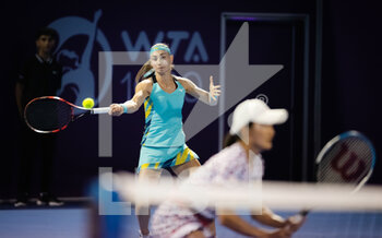 2022-02-24 - Aleksandra Krunic of Serbia & Shuko Aoyama of Japan in action during the doubles semi-final of the 2022 Qatar TotalEnergies Open, WTA 1000 tennis tournament on February 24, 2022 at Khalifa tennis and squash complex in Doha, Qatar - 2022 QATAR TOTALENERGIES OPEN, WTA 1000 TENNIS TOURNAMENT - INTERNATIONALS - TENNIS