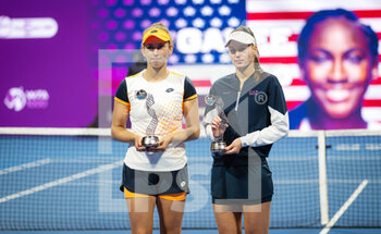 2022-02-25 - Elise Mertens of Belgium & Veronika Kudermetova of Russia with their runner-up trophies after the doubles final of the 2022 Qatar TotalEnergies Open, WTA 1000 tennis tournament on February 25, 2022 at Khalifa tennis and squash complex in Doha, Qatar - 2022 QATAR TOTALENERGIES OPEN, WTA 1000 TENNIS TOURNAMENT - INTERNATIONALS - TENNIS