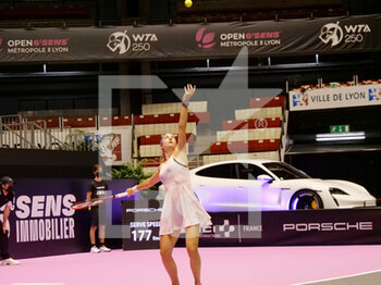 2022-02-28 - Stefanie Voegele (SUI) in action against Elsa Jacquemot (FRA) during the Open 6ème Sens, Métropole de Lyon 2022, WTA 250 tennis tournament on February 28, 2022 at Palais des Sports de Gerland in Lyon, France - OPEN 6èME SENS, MéTROPOLE DE LYON 2022, WTA 250 TENNIS TOURNAMENT - INTERNATIONALS - TENNIS