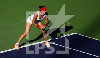 2022-03-09 - Ajla Tomljanovic of Australia in action against Hailey Baptiste of the United States during the first round of the 2022 BNP Paribas Open, WTA 1000 tennis tournament on March 9, 2022 at Indian Wells Tennis Garden in Indian Wells, USA - 2022 BNP PARIBAS OPEN, WTA 1000 TENNIS TOURNAMENT - INTERNATIONALS - TENNIS