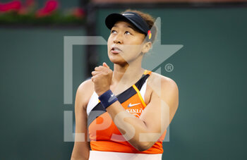 2022-03-10 - Naomi Osaka of Japan in action against Sloane Stephens of the United States during the first round of the 2022 BNP Paribas Open, WTA 1000 tennis tournament on March 10, 2022 at Indian Wells Tennis Garden in Indian Wells, USA - 2022 BNP PARIBAS OPEN, WTA 1000 TENNIS TOURNAMENT - INTERNATIONALS - TENNIS