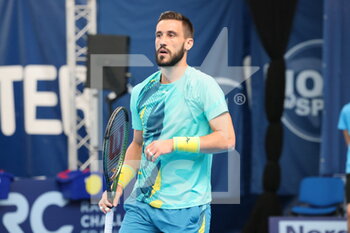2022-03-22 - Damir Dzumhur during the Play In Challenger 2022, ATP Challenger Tour tennis tournament on March 22, 2022 at Tennis Club Lillois Lille Metropole in Lille, France - PLAY IN CHALLENGER 2022, ATP CHALLENGER TOUR TENNIS TOURNAMENT - INTERNATIONALS - TENNIS