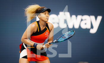 2022-03-24 - Naomi Osaka of Japan in action against Angelique Kerber of Germany during the second round of the 2022 Miami Open, WTA Masters 1000 tennis tournament on March 24, 2022 at Hard Rock stadium in Miami, USA - 2022 MIAMI OPEN, WTA MASTERS 1000 TENNIS TOURNAMENT - INTERNATIONALS - TENNIS