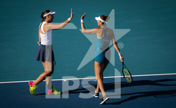 2022-03-26 - Belinda Bencic of Switzerland & Ana Konjuh of Croatia playing doubles at the 2022 Miami Open, WTA Masters 1000 tennis tournament on March 26, 2022 at Hard Rock stadium in Miami, USA - 2022 MIAMI OPEN, WTA MASTERS 1000 TENNIS TOURNAMENT - INTERNATIONALS - TENNIS