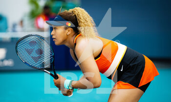 2022-03-28 - Naomi Osaka of Japan in action against Alison Riske of the United States during the fourth round of the 2022 Miami Open, WTA Masters 1000 tennis tournament on March 28, 2022 at Hard Rock stadium in Miami, USA - 2022 MIAMI OPEN, WTA MASTERS 1000 TENNIS TOURNAMENT - INTERNATIONALS - TENNIS