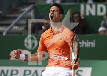 2022-04-12 - Novak Djokovic of Serbia celebrates during day 3 of the Rolex Monte-Carlo Masters 2022, an ATP Masters 1000 tennis tournament on April 12, 2022, held at the Monte-Carlo Country Club in Roquebrune-Cap-Martin, France - ROLEX MONTE-CARLO MASTERS 2022, ATP MASTERS 1000 TENNIS TOURNAMENT - INTERNATIONALS - TENNIS