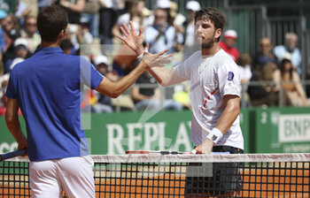 2022-04-13 - Albert Ramos-Vinolas of Spain (left) shakes hands with Cameron Norrie of Great Britain after his victory during day 4 of the Rolex Monte-Carlo Masters 2022, an ATP Masters 1000 tennis tournament on April 13, 2022, held at the Monte-Carlo Country Club in Roquebrune-Cap-Martin, France - ROLEX MONTE-CARLO MASTERS 2022, ATP MASTERS 1000 TENNIS TOURNAMENT - INTERNATIONALS - TENNIS