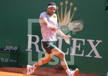 2022-04-14 - Grigor Dimitrov of Bulgaria during the Rolex Monte-Carlo Masters 2022, ATP Masters 1000 tennis tournament on April 15, 2022 at Monte-Carlo Country Club in Roquebrune-Cap-Martin, France - ROLEX MONTE-CARLO MASTERS 2022, ATP MASTERS 1000 TENNIS TOURNAMENT - INTERNATIONALS - TENNIS