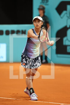 2022-04-26 - Misaki Doi of Japan in action against Andrea Petkovic of Germany during qualifying at the Mutua Madrid Open 2022 tennis tournament on April 26, 2022 at Caja Magica stadium in Madrid, Spain - MUTUA MADRID OPEN 2022 TENNIS TOURNAMENT - INTERNATIONALS - TENNIS