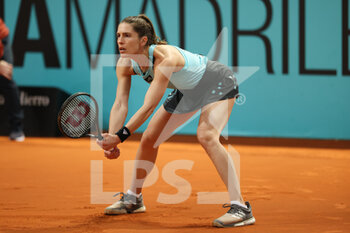 2022-04-26 - Andrea Petkovic of Germany in action against Misaki Doi of Japan during qualifying at the Mutua Madrid Open 2022 tennis tournament on April 26, 2022 at Caja Magica stadium in Madrid, Spain - MUTUA MADRID OPEN 2022 TENNIS TOURNAMENT - INTERNATIONALS - TENNIS