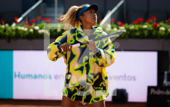 2022-04-29 - Naomi Osaka of Japan before the first round of the Mutua Madrid Open 2022 tennis tournament on April 29, 2022 at Caja Magica stadium in Madrid, Spain - MUTUA MADRID OPEN 2022 TENNIS TOURNAMENT - INTERNATIONALS - TENNIS