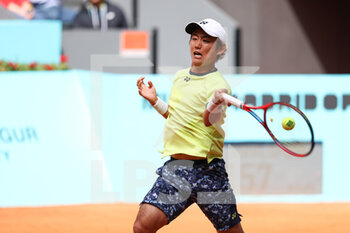2022-04-30 - Yoshihito Nishioka of Japan in action against Lorenzo Musetti of Italy during the Mutua Madrid Open 2022 tennis tournament on April 30, 2022 at Caja Magica stadium in Madrid, Spain - MUTUA MADRID OPEN 2022 TENNIS TOURNAMENT - INTERNATIONALS - TENNIS