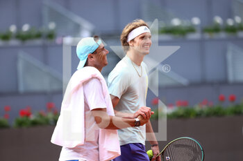 2022-05-02 - Rafael Nadal of Spain and Alexander Zverev of Germany after practice together during the Mutua Madrid Open 2022 tennis tournament on May 2, 2022 at Caja Magica stadium in Madrid, Spain - MUTUA MADRID OPEN 2022 TENNIS TOURNAMENT - INTERNATIONALS - TENNIS