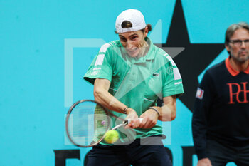 2022-05-02 - Ugo Umbert from France in action against Denis Shapovalov from Canada during the Mutua Madrid Open 2022 tennis tournament on May 2, 2022 at Caja Magica stadium in Madrid, Spain - MUTUA MADRID OPEN 2022 TENNIS TOURNAMENT - INTERNATIONALS - TENNIS