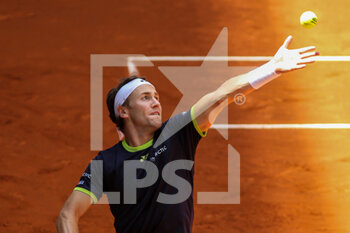 2022-05-04 - Casper Rudd of Norway in action against Dusan Lajovic of Serbia during the Mutua Madrid Open 2022 tennis tournament on May 4, 2022 at Caja Magica stadium in Madrid, Spain - MUTUA MADRID OPEN 2022 TENNIS TOURNAMENT - INTERNATIONALS - TENNIS