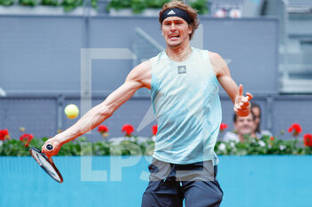 2022-05-04 - Alexander Zverev of Germany in action against Marin Cilic of Croatia during the Mutua Madrid Open 2022 tennis tournament on May 4, 2022 at Caja Magica stadium in Madrid, Spain - MUTUA MADRID OPEN 2022 TENNIS TOURNAMENT - INTERNATIONALS - TENNIS