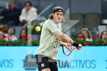 2022-05-04 - Stefanos Tsitsipas of Greece in action against Lucas Pouille of France during the Mutua Madrid Open 2022 tennis tournament on May 4, 2022 at Caja Magica stadium in Madrid, Spain - MUTUA MADRID OPEN 2022 TENNIS TOURNAMENT - INTERNATIONALS - TENNIS