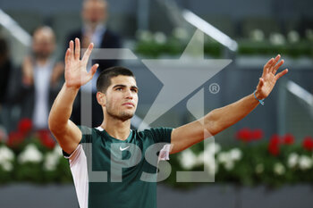 2022-05-05 - Carlos Alcaraz of Spain reacts after winning against Cameron Norrie of Great Britain during the Mutua Madrid Open 2022 tennis tournament on May 5, 2022 at Caja Magica stadium in Madrid, Spain - MUTUA MADRID OPEN 2022 TENNIS TOURNAMENT - INTERNATIONALS - TENNIS