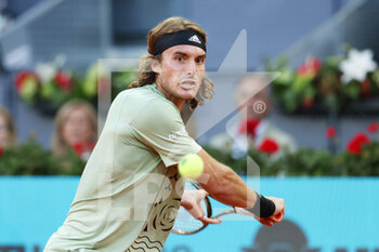 2022-05-06 - Stefanos Tsitsipas of Greece in action against Andrey Rublev of Russia during the Mutua Madrid Open 2022 tennis tournament on May 6, 2022 at Caja Magica stadium in Madrid, Spain - MUTUA MADRID OPEN 2022 TENNIS TOURNAMENT - INTERNATIONALS - TENNIS