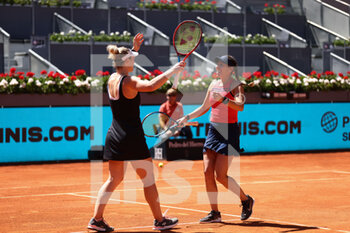2022-05-07 - Gabriela Dabrowski of Canada and Giuliana Olmos of Mexico celebrate after winning doubles against Desirae Krawczyk of United States and Demi Schuurs of The Netherlands, Final WTA Doubles match during the Mutua Madrid Open 2022 tennis tournament on May 7, 2022 at Caja Magica stadium in Madrid, Spain - MUTUA MADRID OPEN 2022 TENNIS TOURNAMENT - INTERNATIONALS - TENNIS