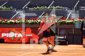 2022-05-07 - Gabriela Dabrowski of Canada and Giuliana Olmos of Mexico celebrate after winning doubles against Desirae Krawczyk of United States and Demi Schuurs of The Netherlands, Final WTA Doubles match during the Mutua Madrid Open 2022 tennis tournament on May 7, 2022 at Caja Magica stadium in Madrid, Spain - MUTUA MADRID OPEN 2022 TENNIS TOURNAMENT - INTERNATIONALS - TENNIS