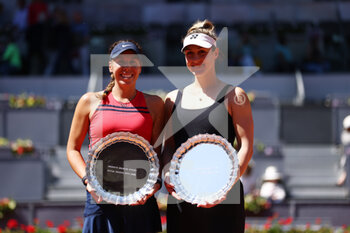 2022-05-07 - Gabriela Dabrowski of Canada and Giuliana Olmos of Mexico pose for photo with the winners trophy, Final WTA Doubles match during the Mutua Madrid Open 2022 tennis tournament on May 7, 2022 at Caja Magica stadium in Madrid, Spain - MUTUA MADRID OPEN 2022 TENNIS TOURNAMENT - INTERNATIONALS - TENNIS