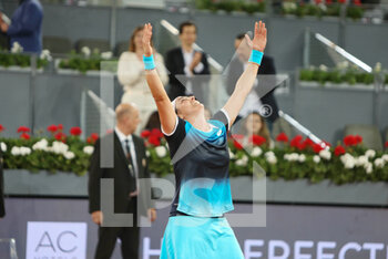 2022-05-07 - Ons Jabeur of Tunisia reacts after winning against Jessica Pegula of United States, Women's Final during the Mutua Madrid Open 2022 tennis tournament on May 7, 2022 at Caja Magica stadium in Madrid, Spain - MUTUA MADRID OPEN 2022 TENNIS TOURNAMENT - INTERNATIONALS - TENNIS