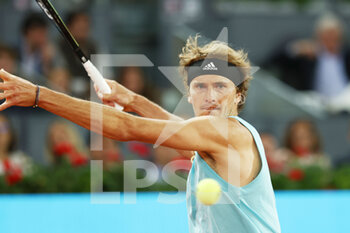 2022-05-07 - Alexander Zverev of Germany in action against Stefanos Tsitsipas of Greece during the Mutua Madrid Open 2022 tennis tournament on May 7, 2022 at Caja Magica stadium in Madrid, Spain - MUTUA MADRID OPEN 2022 TENNIS TOURNAMENT - INTERNATIONALS - TENNIS