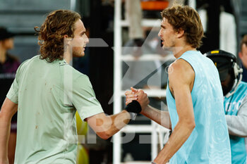 2022-05-07 - Alexander Zverev of Germany reacts after winning against Stefanos Tsitsipas of Greece during the Mutua Madrid Open 2022 tennis tournament on May 7, 2022 at Caja Magica stadium in Madrid, Spain - MUTUA MADRID OPEN 2022 TENNIS TOURNAMENT - INTERNATIONALS - TENNIS