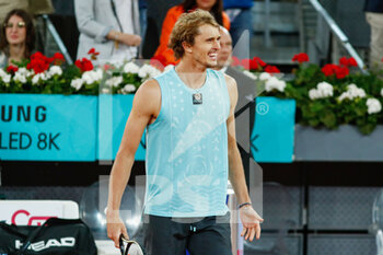2022-05-07 - Alexander Zverev of Germany reacts after winning against Stefanos Tsitsipas of Greece during the Mutua Madrid Open 2022 tennis tournament on May 7, 2022 at Caja Magica stadium in Madrid, Spain - MUTUA MADRID OPEN 2022 TENNIS TOURNAMENT - INTERNATIONALS - TENNIS