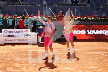 2022-05-08 - Wesley Koolhof of The Netherlands and Neal Skupski of Great Britain react after winning against Juan Sebastian Cabal and Robert Farah of Colombia, Final ATP doubles match during the Mutua Madrid Open 2022 tennis tournament on May 8, 2022 at Caja Magica stadium in Madrid, Spain - MUTUA MADRID OPEN 2022 TENNIS TOURNAMENT - INTERNATIONALS - TENNIS