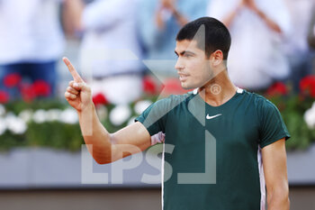 2022-05-08 - Carlos Alcaraz of Spain reacts after winning against Alexander Zverev of Germany, Men's Final during the Mutua Madrid Open 2022 tennis tournament on May 8, 2022 at Caja Magica stadium in Madrid, Spain - MUTUA MADRID OPEN 2022 TENNIS TOURNAMENT - INTERNATIONALS - TENNIS