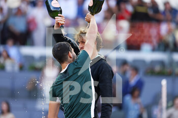 2022-05-08 - Carlos Alcaraz of Spain (winner) and Alexander Zverev of Germany (second place) celebrate, Men's Final during the Mutua Madrid Open 2022 tennis tournament on May 8, 2022 at Caja Magica stadium in Madrid, Spain - MUTUA MADRID OPEN 2022 TENNIS TOURNAMENT - INTERNATIONALS - TENNIS
