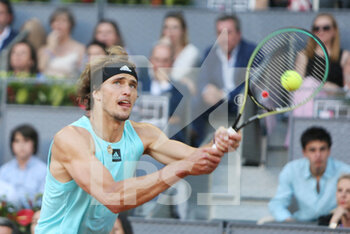 2022-05-08 - Alexander Zverev of Germany in action against Carlos Alcaraz of Spain, Final Men's ATP match during the Mutua Madrid Open 2022 tennis tournament on May 8, 2022 at Caja Magica stadium in Madrid, Spain - MUTUA MADRID OPEN 2022 TENNIS TOURNAMENT - INTERNATIONALS - TENNIS