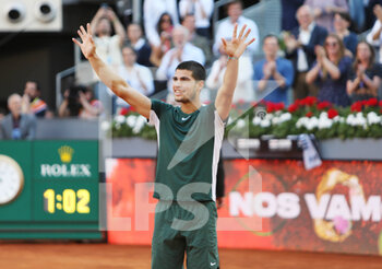 2022-05-08 - Carlos Alcaraz of Spain reacts after winning against Alexander Zverev of Germany, Final Men's ATP match during the Mutua Madrid Open 2022 tennis tournament on May 8, 2022 at Caja Magica stadium in Madrid, Spain - MUTUA MADRID OPEN 2022 TENNIS TOURNAMENT - INTERNATIONALS - TENNIS