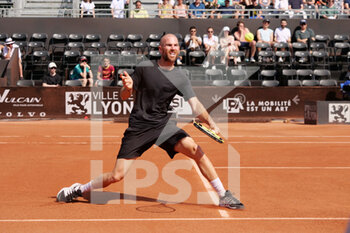 2022-05-15 - Adrian Mannarino (FRA) in action against Aslan Karatsev (RUS) during the round of 32 at the Open Parc Auvergne-Rhone-Alpes Lyon 2022, ATP 250 Tennis tournament on May 15, 2022 at Parc de la Tete d'Or in Lyon, France - OPEN PARC AUVERGNE-RHONE-ALPES LYON 2022, ATP 250 TENNIS TOURNAMENT - INTERNATIONALS - TENNIS