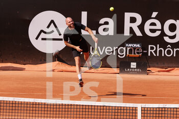 2022-05-15 - Adrian Mannarino (FRA) in action against Aslan Karatsev (RUS) during the round of 32 at the Open Parc Auvergne-Rhone-Alpes Lyon 2022, ATP 250 Tennis tournament on May 15, 2022 at Parc de la Tete d'Or in Lyon, France - OPEN PARC AUVERGNE-RHONE-ALPES LYON 2022, ATP 250 TENNIS TOURNAMENT - INTERNATIONALS - TENNIS