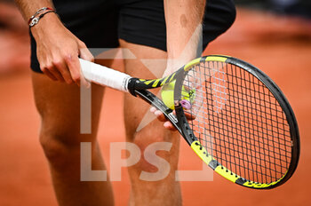 2022-05-16 - Illustration of a tennis racket with a ball during the Qualifying Day one of Roland-Garros 2022, French Open 2022, Grand Slam tennis tournament on May 16, 2022 at the Roland-Garros stadium in Paris, France - ROLAND-GARROS 2022, FRENCH OPEN 2022, GRAND SLAM TENNIS TOURNAMENT - INTERNATIONALS - TENNIS