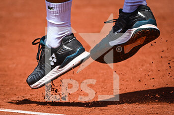 2022-05-16 - Detail of Yonex shoes during the Qualifying Day one of Roland-Garros 2022, French Open 2022, Grand Slam tennis tournament on May 16, 2022 at the Roland-Garros stadium in Paris, France - ROLAND-GARROS 2022, FRENCH OPEN 2022, GRAND SLAM TENNIS TOURNAMENT - INTERNATIONALS - TENNIS