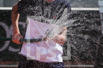 2022-05-16 - Illustration of watering during the Qualifying Day one of Roland-Garros 2022, French Open 2022, Grand Slam tennis tournament on May 16, 2022 at the Roland-Garros stadium in Paris, France - ROLAND-GARROS 2022, FRENCH OPEN 2022, GRAND SLAM TENNIS TOURNAMENT - INTERNATIONALS - TENNIS