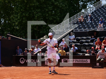 2022-05-16 - Jo-Wilfried Tsonga (FRA) in action against Alex Molcan (SK) during the round of 32 at the Open Parc Auvergne-Rhone-Alpes Lyon 2022, ATP 250 Tennis tournament on May 16, 2022 at Parc de la Tete d'Or in Lyon, France - OPEN PARC AUVERGNE-RHONE-ALPES LYON 2022, ATP 250 TENNIS TOURNAMENT - INTERNATIONALS - TENNIS