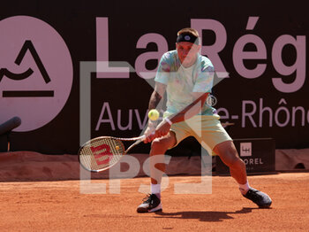 2022-05-16 - Alex Molcan (SVK) in action against Jo-Wilfried Tsonga (FRA) during the round of 32 at the Open Parc Auvergne-Rhone-Alpes Lyon 2022, ATP 250 Tennis tournament on May 16, 2022 at Parc de la Tete d'Or in Lyon, France - OPEN PARC AUVERGNE-RHONE-ALPES LYON 2022, ATP 250 TENNIS TOURNAMENT - INTERNATIONALS - TENNIS