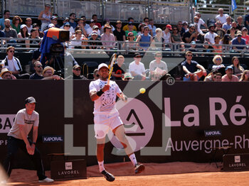 2022-05-16 - Jo-Wilfried Tsonga (FRA) in action against Alex Molcan (SK) during the round of 32 at the Open Parc Auvergne-Rhone-Alpes Lyon 2022, ATP 250 Tennis tournament on May 16, 2022 at Parc de la Tete d'Or in Lyon, France - OPEN PARC AUVERGNE-RHONE-ALPES LYON 2022, ATP 250 TENNIS TOURNAMENT - INTERNATIONALS - TENNIS