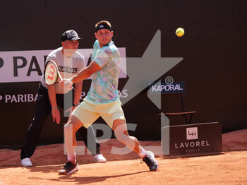 2022-05-16 - Alex Molcan (SVK) in action against Jo-Wilfried Tsonga (FRA) during the round of 32 at the Open Parc Auvergne-Rhone-Alpes Lyon 2022, ATP 250 Tennis tournament on May 16, 2022 at Parc de la Tete d'Or in Lyon, France - OPEN PARC AUVERGNE-RHONE-ALPES LYON 2022, ATP 250 TENNIS TOURNAMENT - INTERNATIONALS - TENNIS